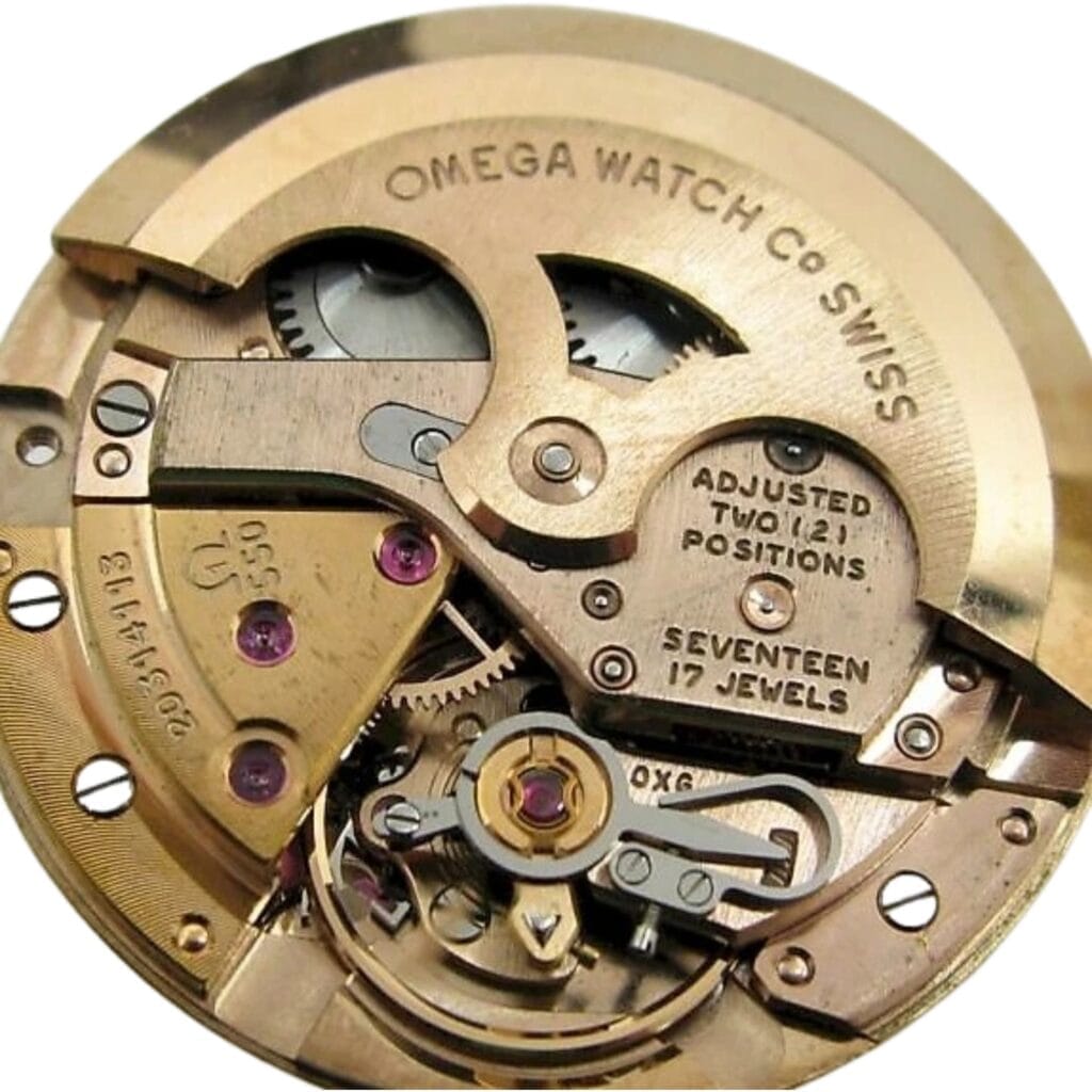 Close-up of an Omega Swiss 550 watch movement showing gears, jewels, and engraved markings on the mechanism.