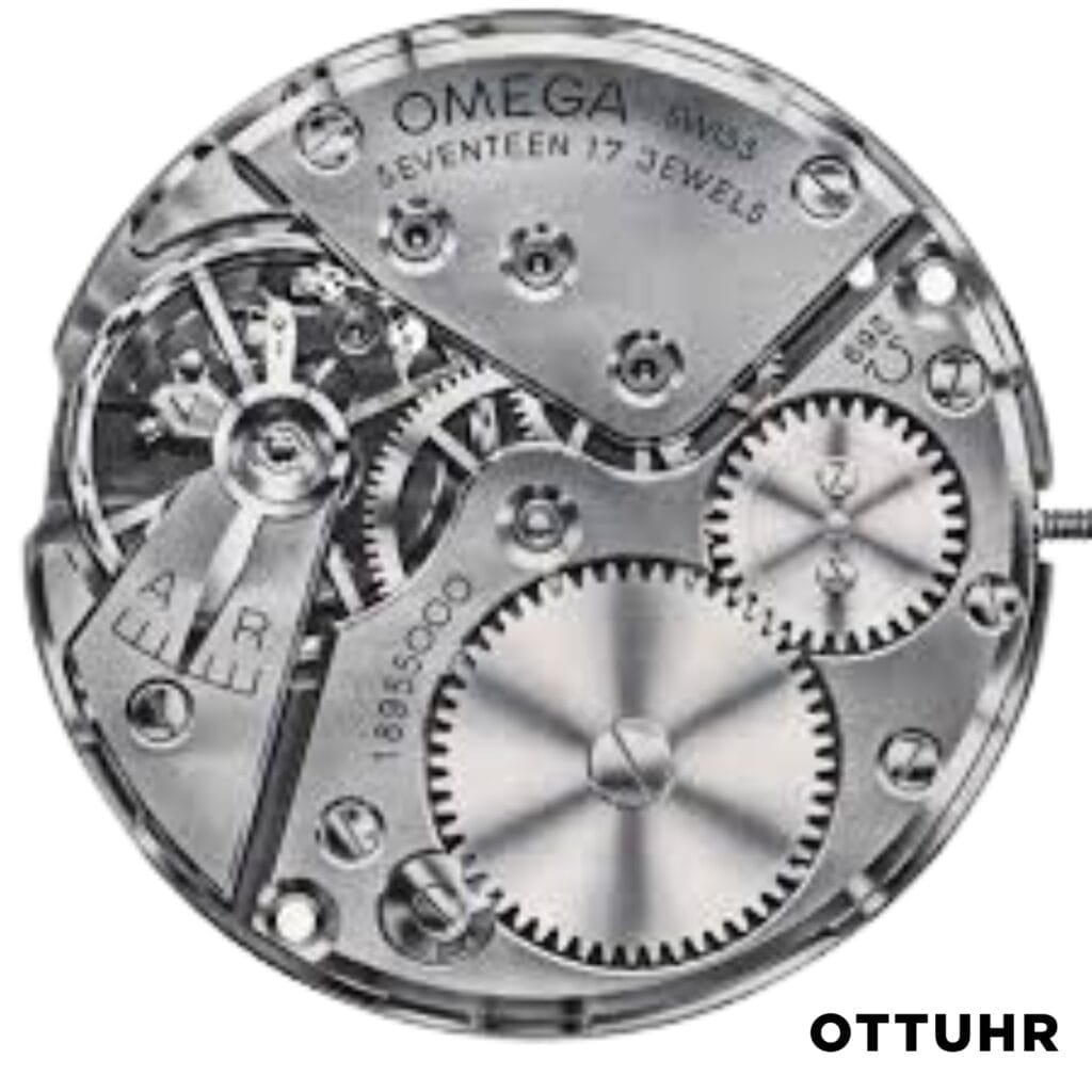 Close-up of an Omega 269 watch movement mechanism with visible gears, labeled parts, and engraved text.