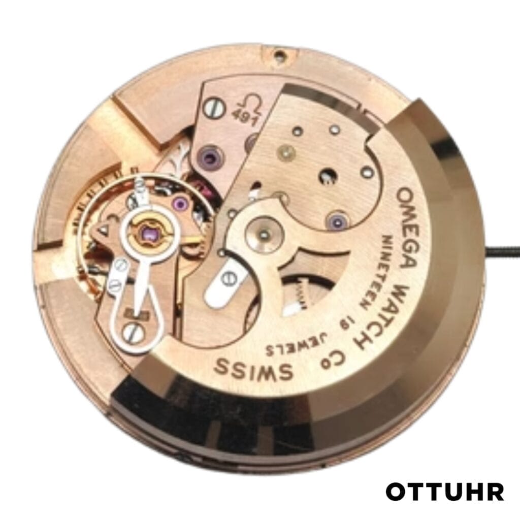 Close-up of an Omega 491 watch movement with visible gears and engraved text on a white background.