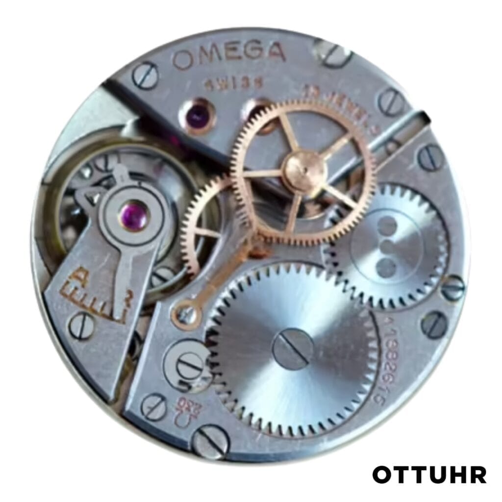 Close-up of an Omega watch movement reveals intricate gears, wheels, and mechanical details, with OTTUHR text below.