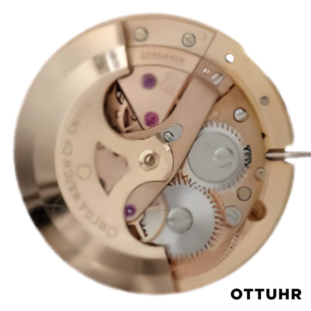 Close-up of a gold mechanical watch movement with gears, featuring the model number 752 and OTTUHR text in the bottom right corner.