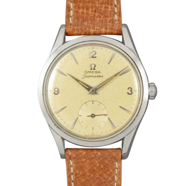 Vintage Omega Seamaster 2937 watch with a cream dial, brown leather strap, and silver hour markers.
