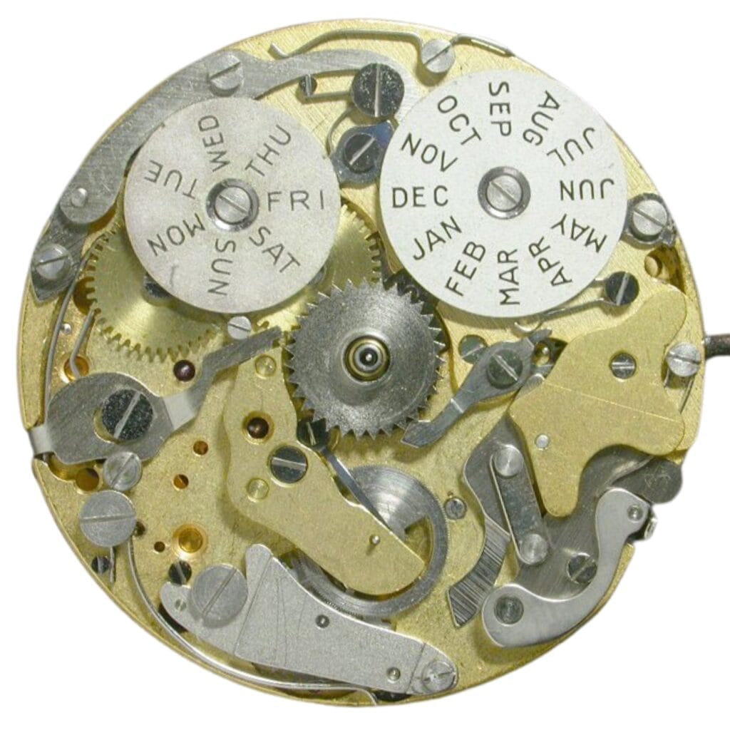 Close-up of a Valjoux mechanical watch movement with visible gears and day and month indicators.
