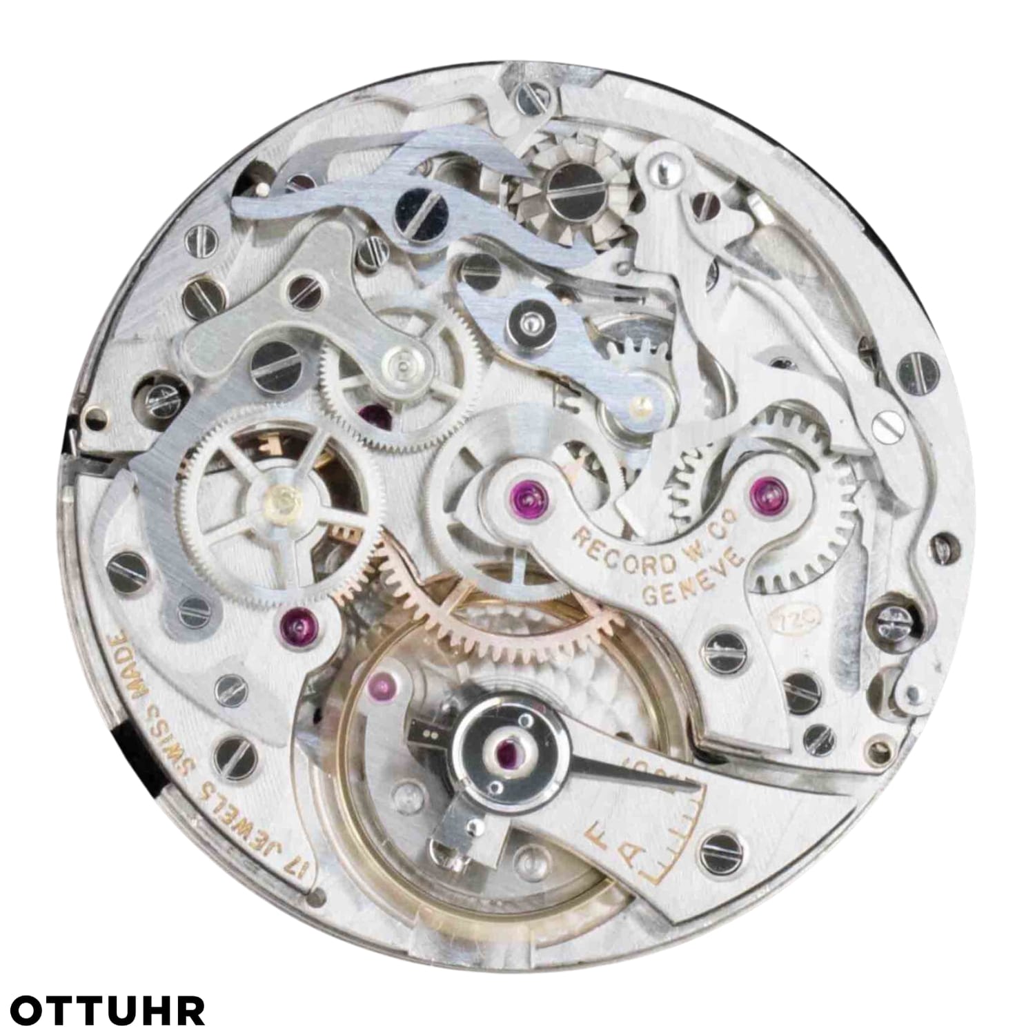 Close-up of an intricate Swiss watch movement, showcasing visible gears and mechanisms powered by the renowned Valjoux 72C.