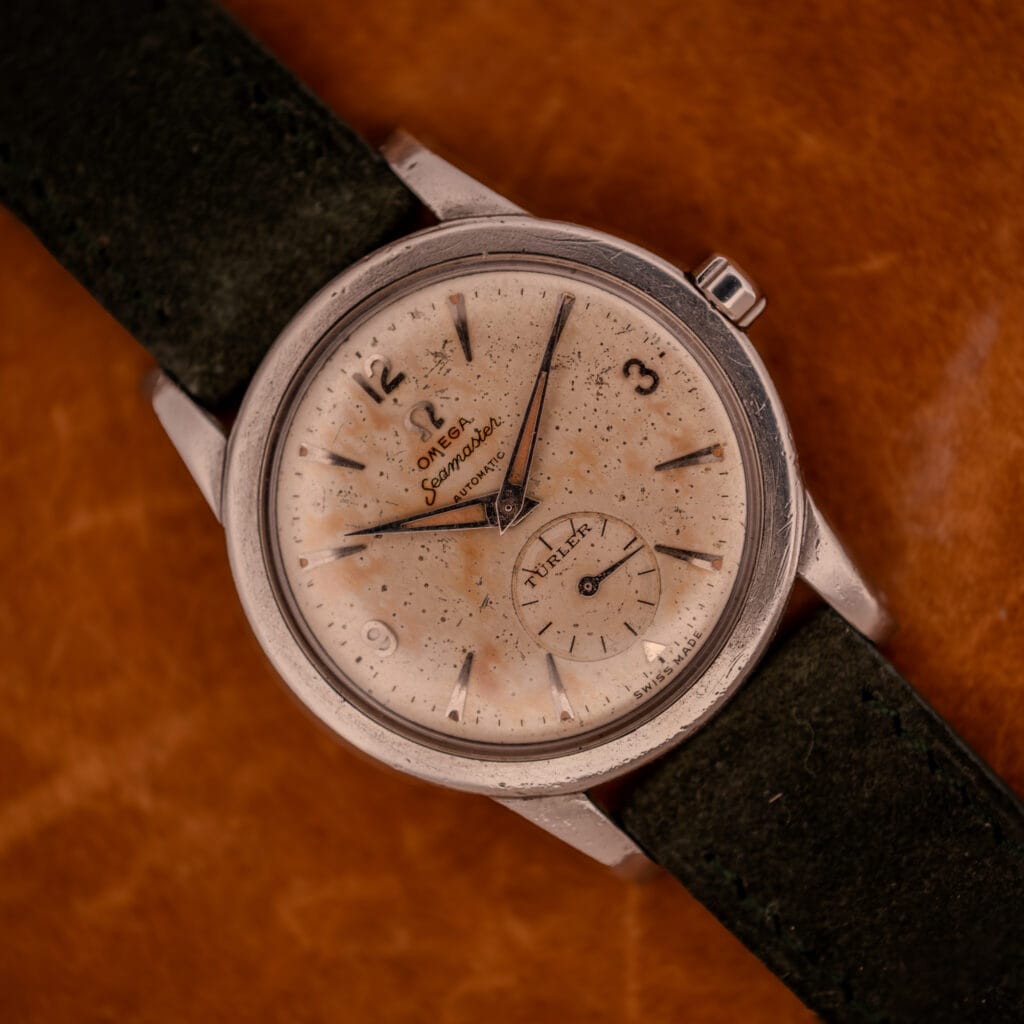 Omega Seamaster Bumper Ref. 2576-14 on olive suede with full dial and beefy lug case profile visible