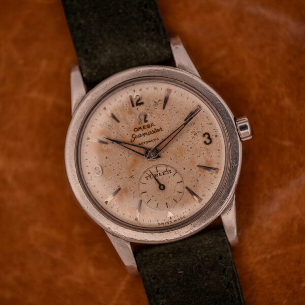 Three-quarter view of Omega Seamaster Bumper Ref. 2576-14 stainless case with crown and downturned lugs