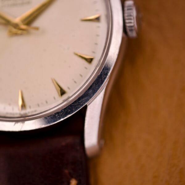 Close-up of an Omega Jumbo Ref. 2640 Manual Wind Cal. 283 with a cream "Türler" dial, gold hour markers, and a brown leather strap.