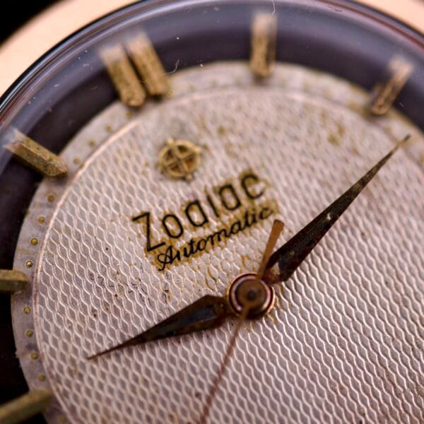 Close-up of the Zodiac Glorious Automatic Tuxedo Dial Ref. 688 Cal. 1361, highlighting its gold hour markers and refined tuxedo-style dial.