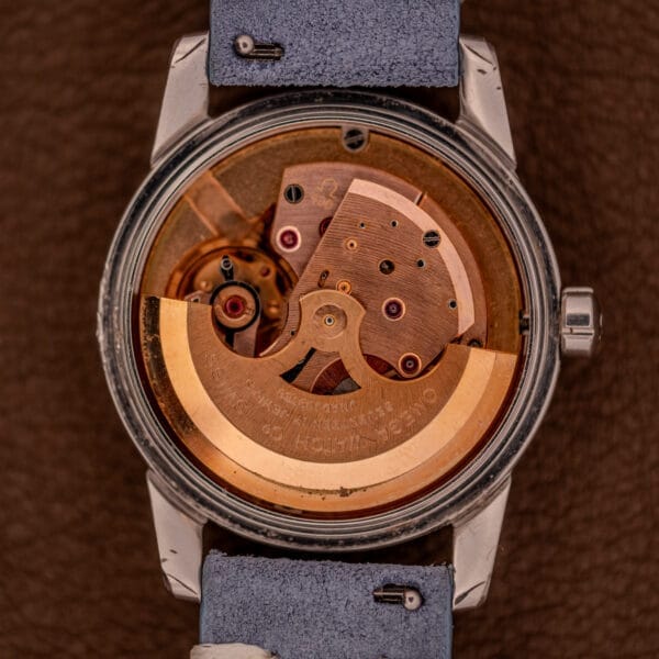 Close-up of the Omega Seamaster Automatic Tropic Dial Ref. 2848 Cal. 490’s exposed mechanical movement, showcasing its visible rotor and intricate gears that highlight its fine craftsmanship.