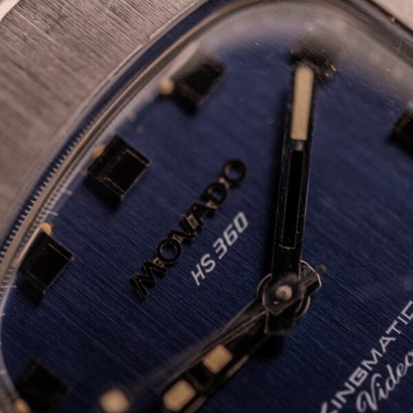 Close-up of a Movado HS 360 Kingmatic Video Blue Dial Ref. 409-705 Cal. 408 watch face, highlighting the blue dial, hands, hour markers, and HS 360 text.