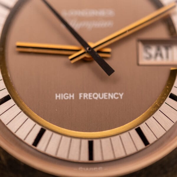 Close-up of the Longines Olympian High Frequency Ref. 3141, showcasing gold hands, date window, and HIGH FREQUENCY text—driven by the precise Cal. 6972 movement.