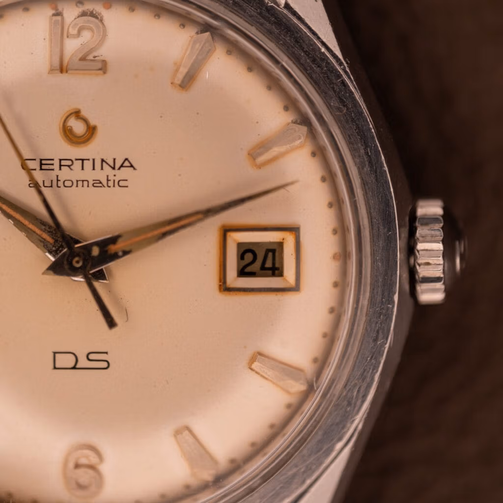 Close-up of a 1959 Certina DS Automatic Date 1st Edition Stainless Steel Cal. 25-451, showing the date as 24 and the time as 7:42:53.