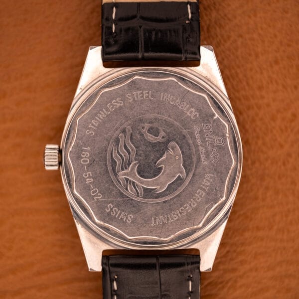 The Enciar Ocean Peal 17 Star Jewels "Space Ship Seconds" Ref. 2334 features a fish engraving, water resistance and stainless steel details, plus a special nod to its precise Space Ship Seconds on the case back.