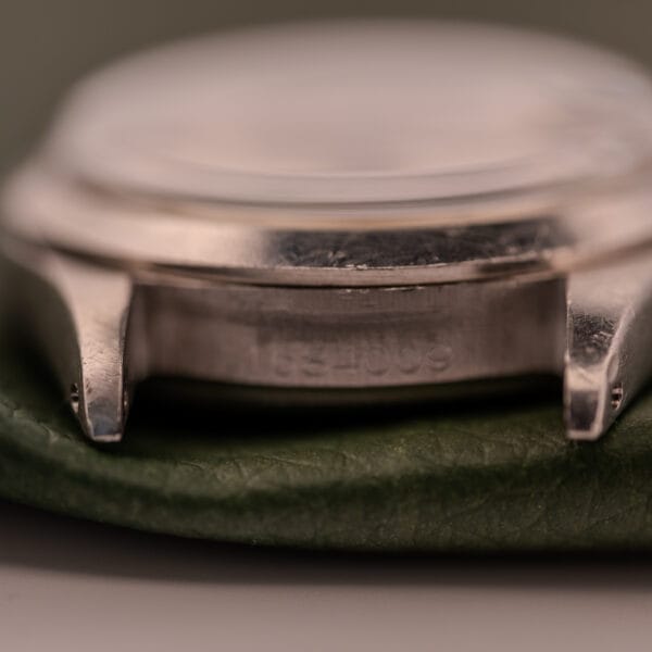 Close-up of the Rolex Oysterdate Precision Ref. 6466 in stainless steel, highlighting the engraved number 1834009 on the case side.