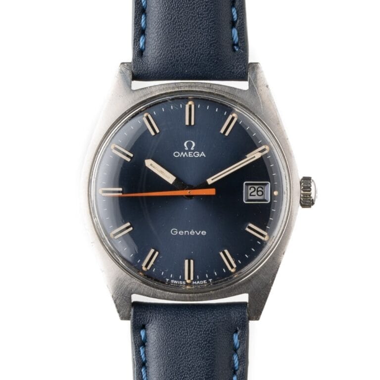 A vintage Omega Genève 136.041 wristwatch with a blue dial, orange second hand, and black leather strap.