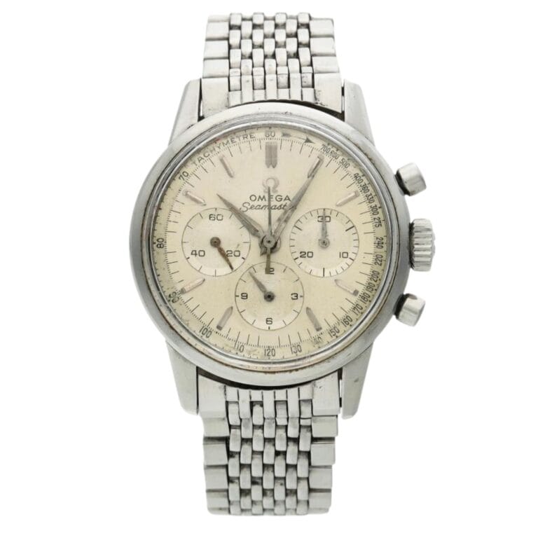 Vintage Omega Seamaster 105.001 wristwatch with a metal bracelet and three subdials on a cream face.