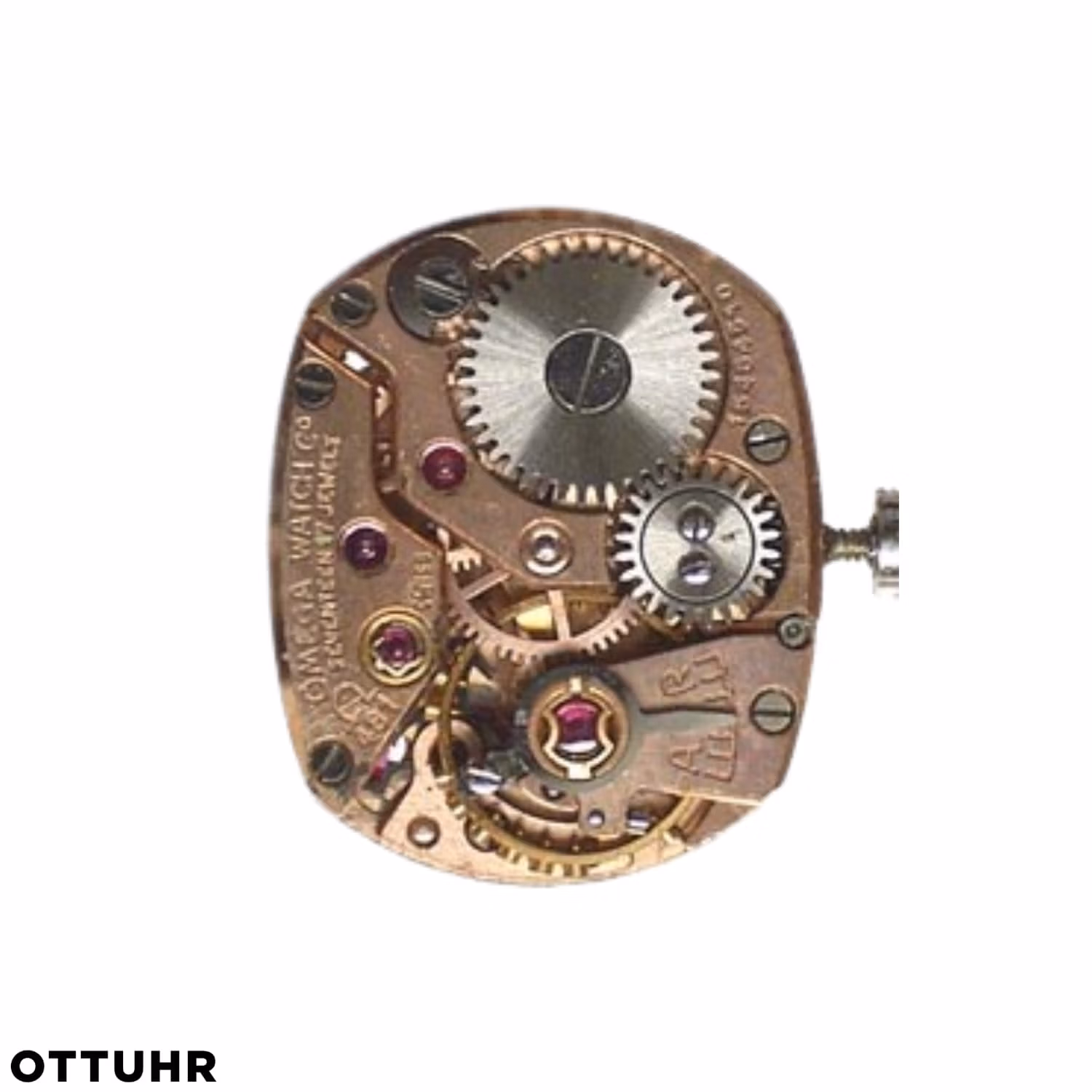A close-up of a vintage mechanical watch movement, showing gears and intricate internal components.