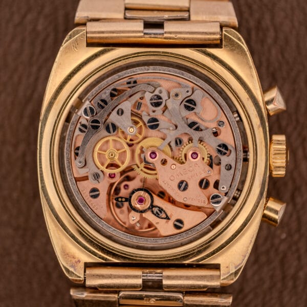 Close-up of an Omega Seamaster Chronograph Ref 145.029 case back, showcasing the intricate Cal. 861 mechanical movement.