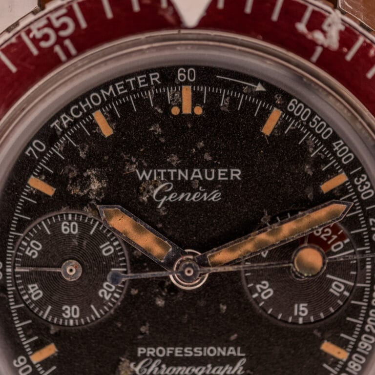 Close-up of the Wittnauer Professional Chronograph Ref. 7004 Landeron 248, showcasing its aged hands, weathered dial, and classic Swiss movement.