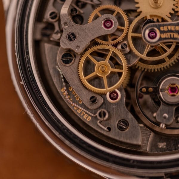Close-up of the intricate gears and metal cogs inside the Wittnauer Professional Chronograph Ref. 7004 Landeron 248, highlighting the fine details of its movement.