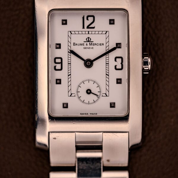 Baume Mercier Hampton XL MV045063 wristwatch with a white dial, stainless steel band, and black numerals.