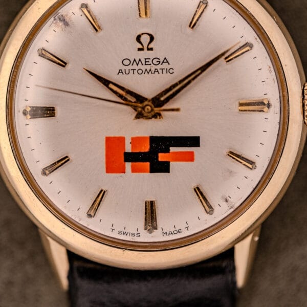 Close-up of the Omega Automatic Ref. LU 6304, showcasing its “HF” Logo Dial above the 6 o’clock position and elegant 10k GF bezel.
