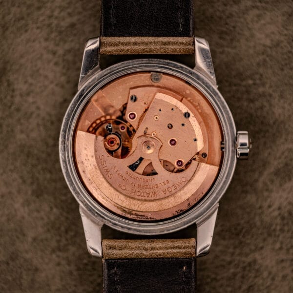 Close-up of the back of an Omega Automatic Seamaster Ref. 2848 Black Dial Cal. 500, highlighting its exposed mechanical movement.