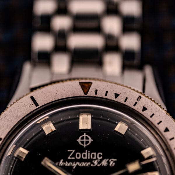 Close-up of the Zodiac Aerospace GMT Ref. 752-934, featuring its black dial and chrome bezel.