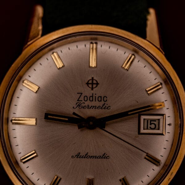 Close-up of a vintage Zodiac Hermetic Date Sunburst Dial Ref. 723-917 Automatic Cal. 70-72 watch, showing the time at 9:15 and date display marked 15.