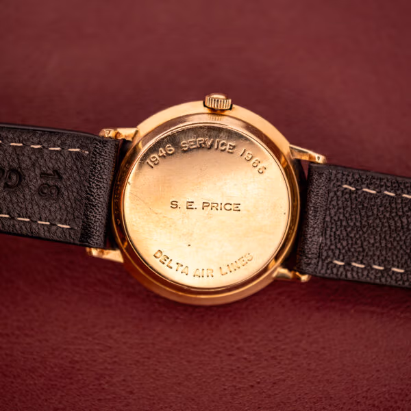 Hamilton Thin-O-Matic Masterpiece caseback macro of the Delta Air Lines presentation engraving for S. E. Price, 1946 to 1966.