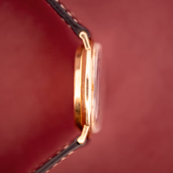 Hamilton Thin-O-Matic case profile from the opposite side showing polished gold filled lugs and slim Thin-O-Matic case silhouette.