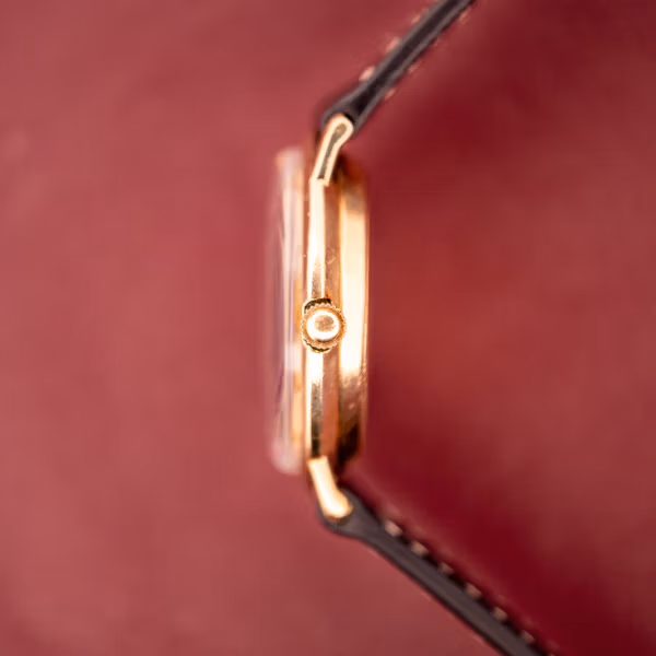 Hamilton Thin-O-Matic side profile detail with signed crown at three and polished 10k gold filled case flank.