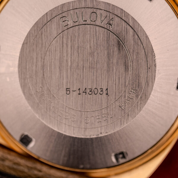 Close-up of the back of a Bulova Automatic Ambassador Day-Date Ref. 7532-1 Cal. 11AOACB c.1970s, with engraved serial number and "STAINLESS STEEL BACK.