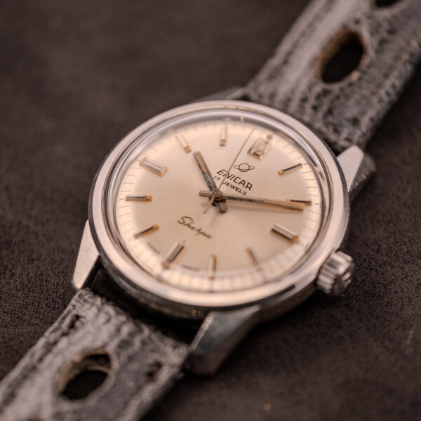 Close-up of an Enicar Sherpa Seapearl 600 Super Compressor Ref. 140/013 Cal. AR 1140, featuring a beige dial and worn black leather strap.