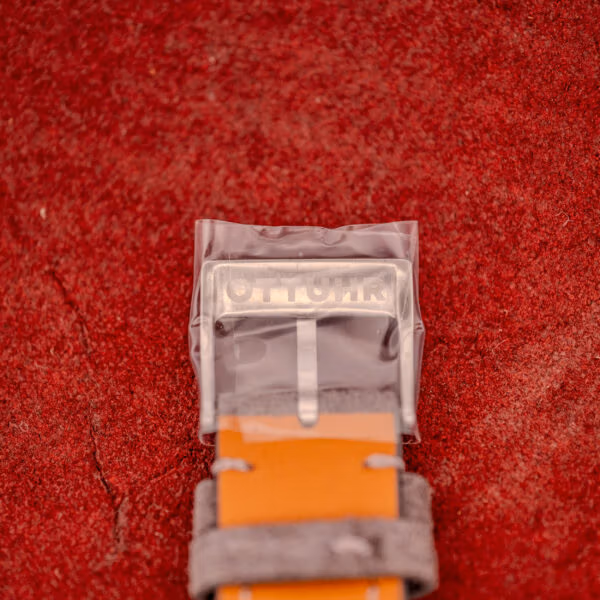 OTTUHR-signed steel buckle on the grey suede strap fitted to the Omega Seamaster 165.002