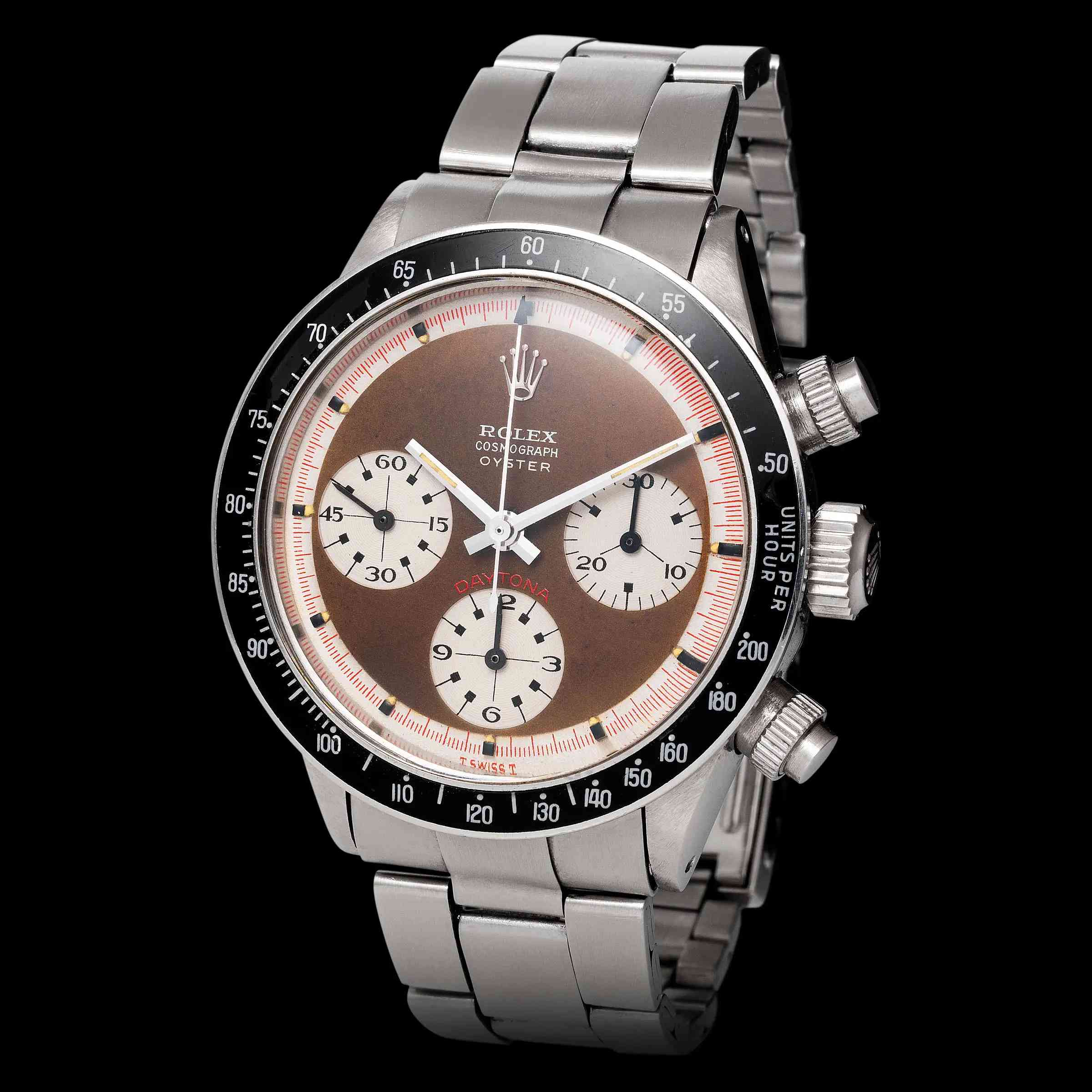 A stainless steel Rolex Daytona watch with a tropical brown dial, three subdials, and a metal bracelet—perfect for collectors who appreciate vintage watches.