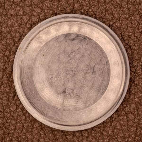 Omega Seamaster 166.002 inner caseback stamped 166.002, FAB SUISSE, SWISS MADE with the Omega heraldic shield