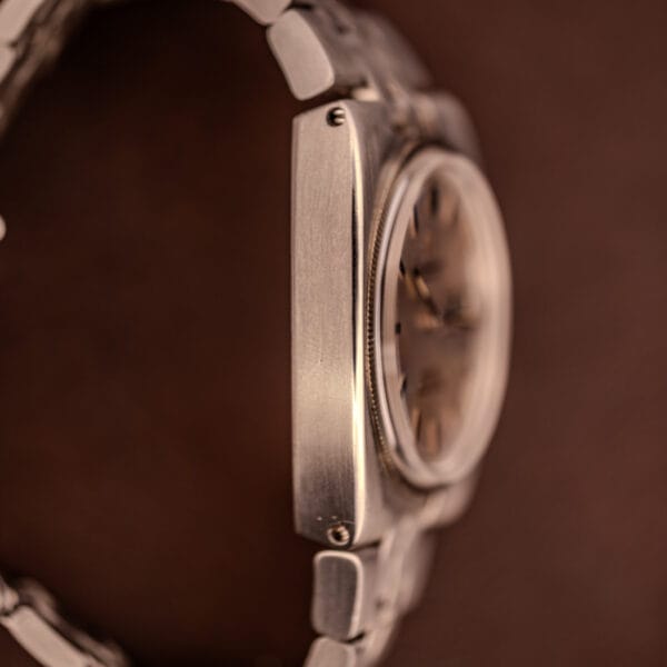 Omega Constellation 168.045 C-shape case profile showing vertically brushed steel flank