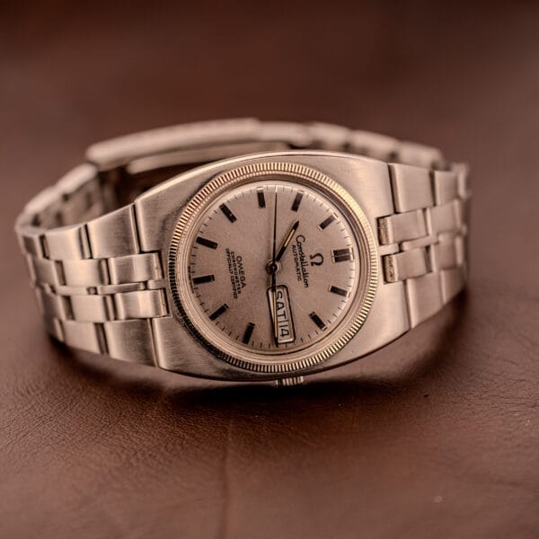 Omega Constellation 168.045 silver dial cushion-case detail in natural light