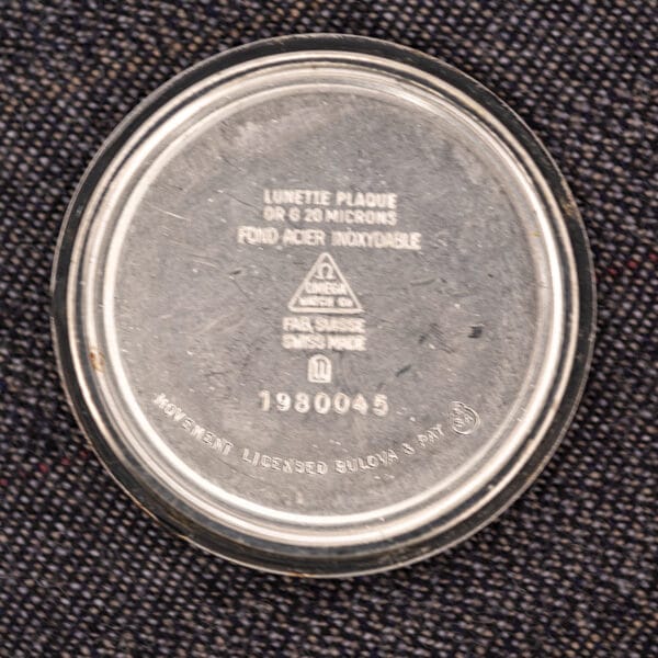 Omega F-300 Hz outer caseback stamped LUNETTE PLAQUE OR G 20 MICRONS, FOND ACIER INOXYDABLE, MOVEMENT LICENSED BULOVA AND PAT, ref. 1980045