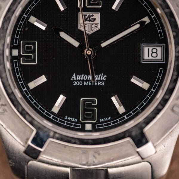 TAG Heuer 2000 Series WN2111 automatic diver three-quarter view on suede