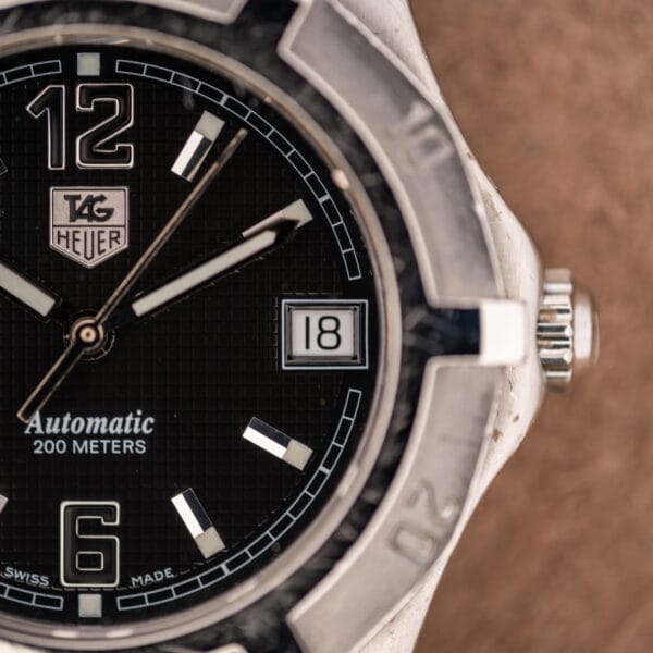 TAG Heuer 2000 Series WN2111 dial detail with date window at 3 and Automatic 200 Meters print