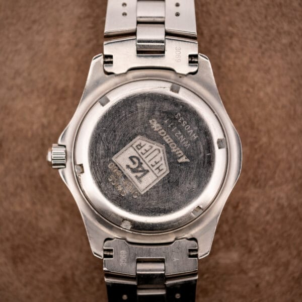TAG Heuer 2000 Series WN2111 stainless steel caseback stamped with TAG Heuer shield, Automatic, and reference WN2111
