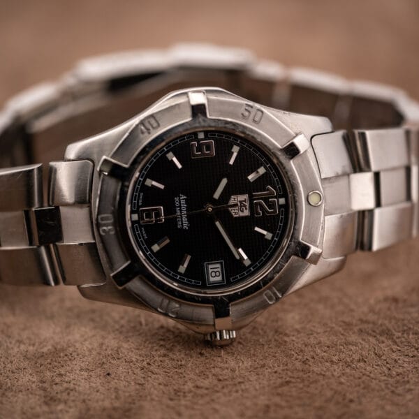 TAG Heuer 2000 Series WN2111 wrist-angle view on original stainless bracelet