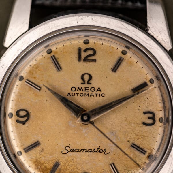 Omega Seamaster 2828 factory tropical dial macro showing applied logo and Automatic text