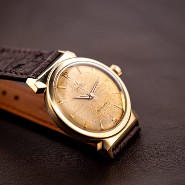Omega Seamaster Ref. 14363-3 angled wrist-ready view on chocolate ostrich leather strap