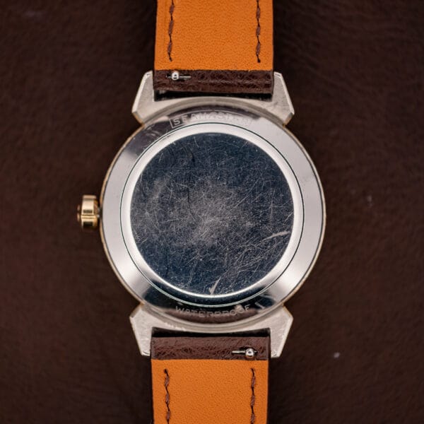 Omega Seamaster 14363-3 stainless steel caseback exterior with WATERPROOF stamp on ostrich strap