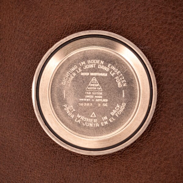 Omega Seamaster 14363-3 inner caseback stamped 14363 3 SC with Omega Watch Co triangle and gasket text