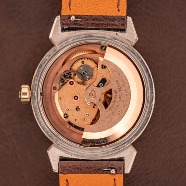 Omega caliber 500 full-rotor automatic movement with copper rotor and seventeen-jewel bridges inside 14363-3