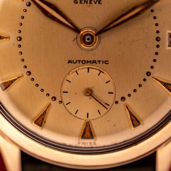 Universal Geneve 138C dial macro with sub-seconds register at six and SWISS printing